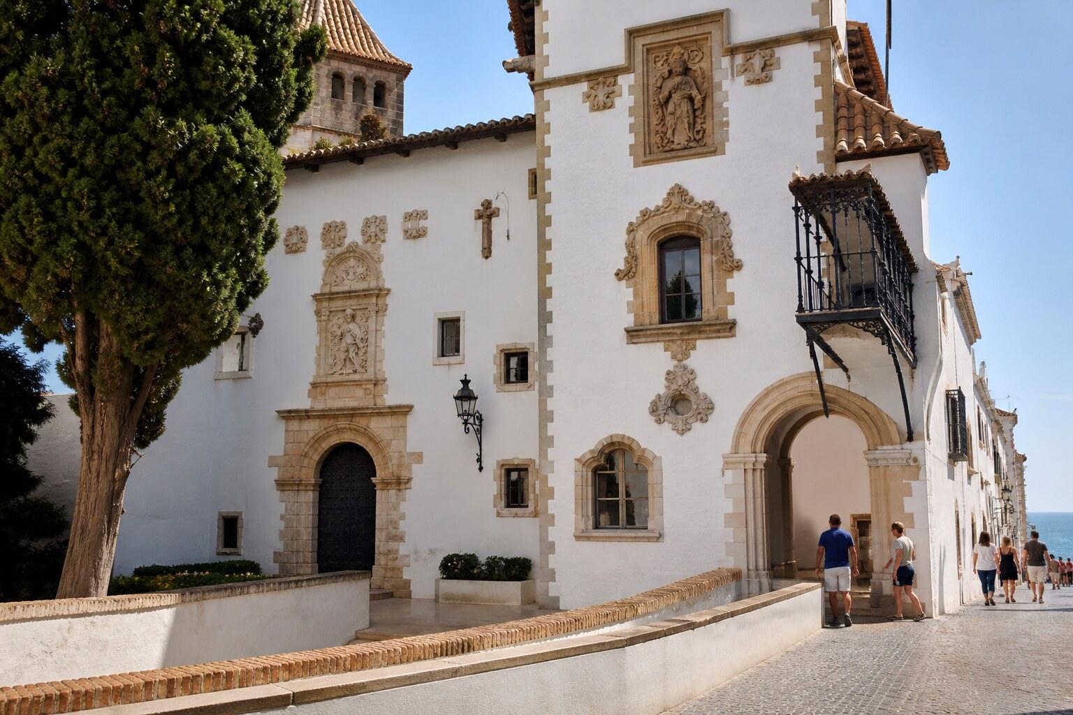 Cau Ferrat and Maricel façades on a narrow Sitges street